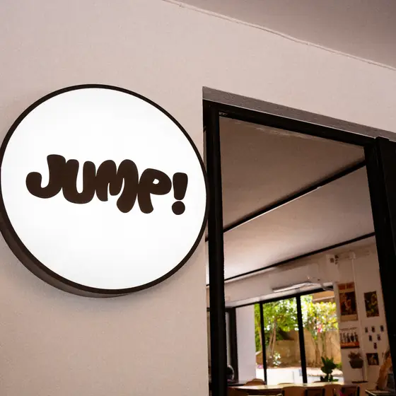 The illuminated Jump! sign above the doorway